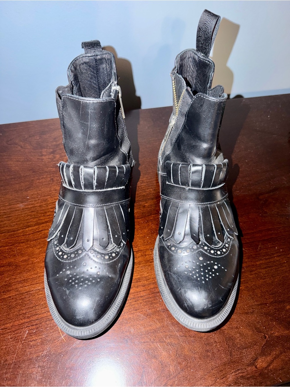 Dr. Martens Black Wingtip Fringe Leather Boots